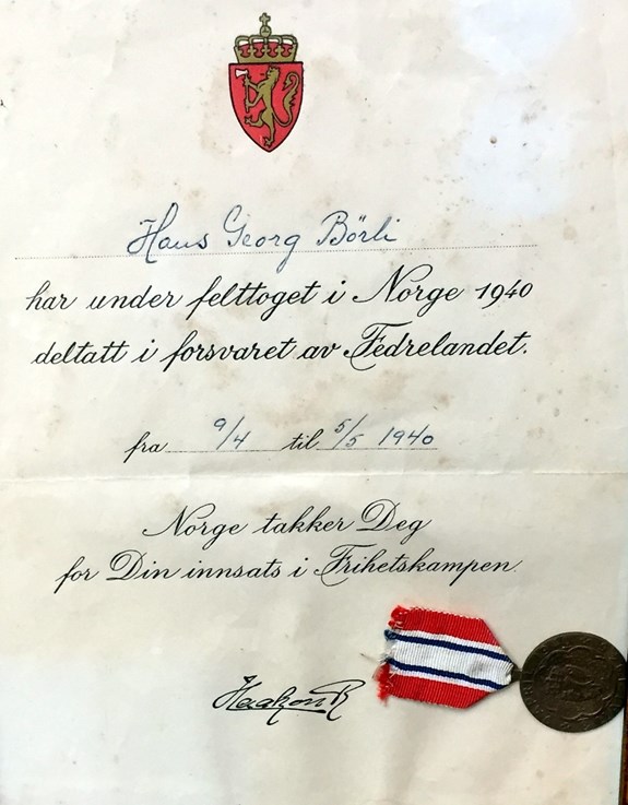 Acknowledgments signed by the King Haakon VII.