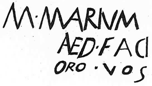 Dipinto z Pompejí (nápis namalovaný na zdi) psané kapitálou (CIL IV 61). Jedná se o volební nápis. Text: Marcum Marium aedilem faci(atis) oro vos. "Prosím zvolte M. Maria edilem."