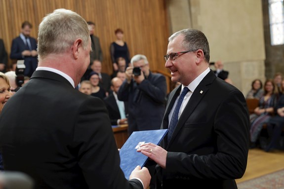 Tomáš Kašparovský,  the Dean of the Faculty of Science, receiving the appointment decree from Petr Gazdík, the Minister of Education, Youth and Sports. Photo: Hynek Glos