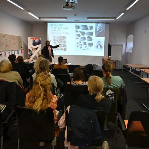 Participants at the “Triple Life of Medieval Pottery” conference during a presentation by M. Pták.