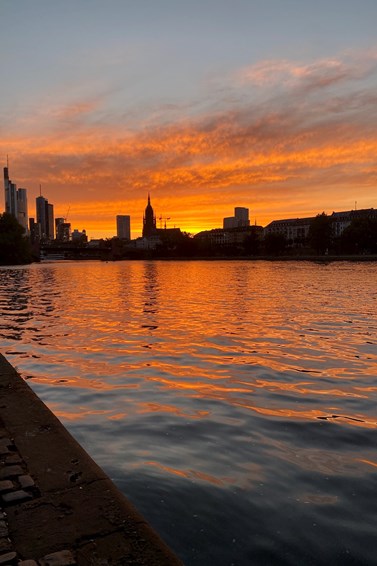 Flamboyant sunset and an exuberant display of silhouette of Frankfurt's skyline