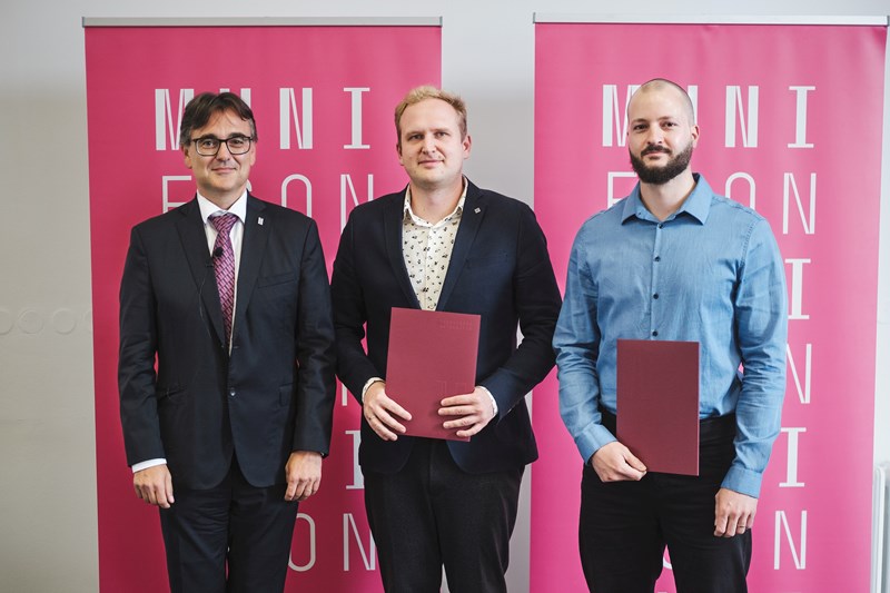 Oleg Deev and Tomáš Plíhal receive the Dean's Special Recognition for their article.